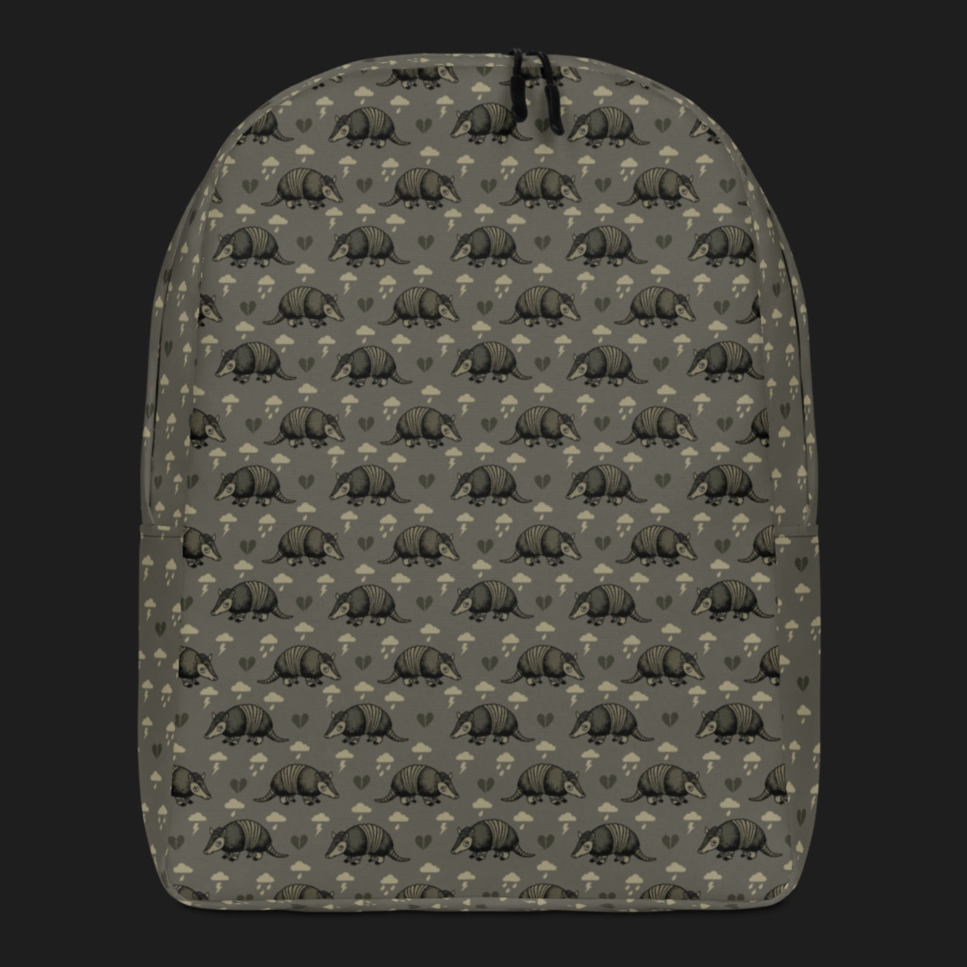 an emo armadillo patterned backpack with broken hearts and storm clouds in brownish grey
