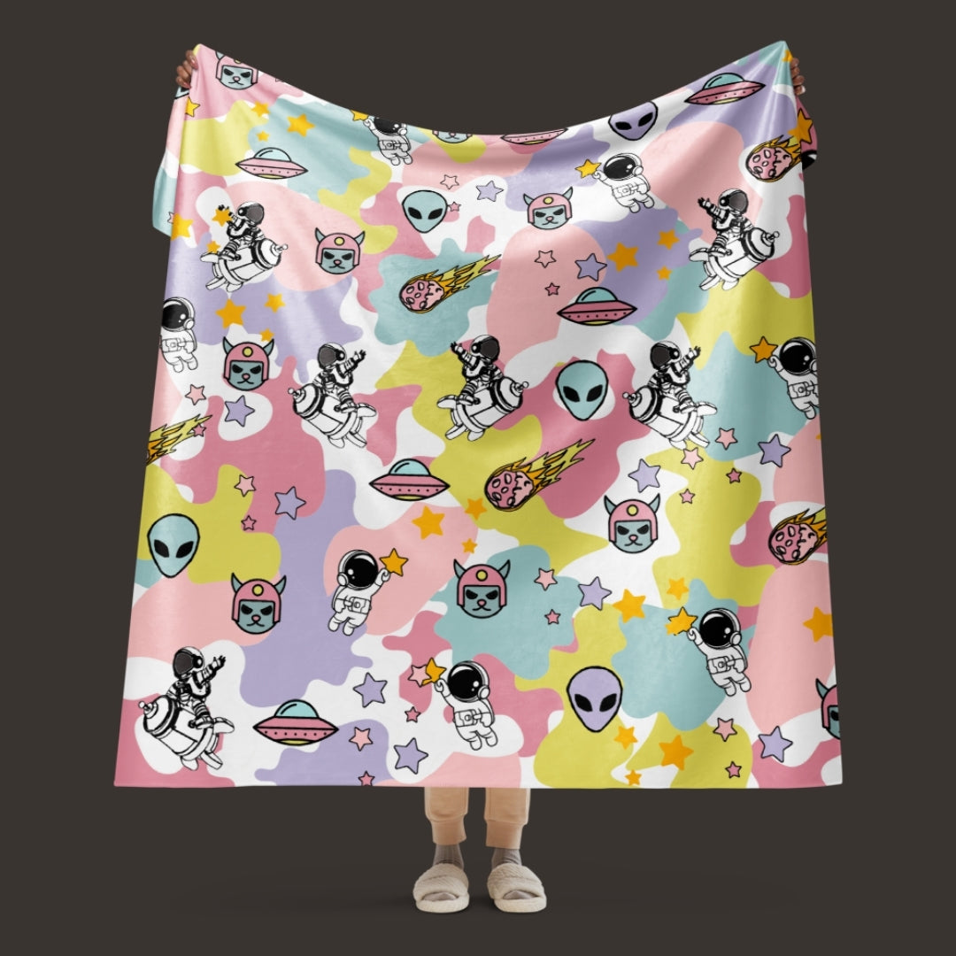 A large sherpa blanket with a dreamy ice cream like cosmos motif in y2k revival style