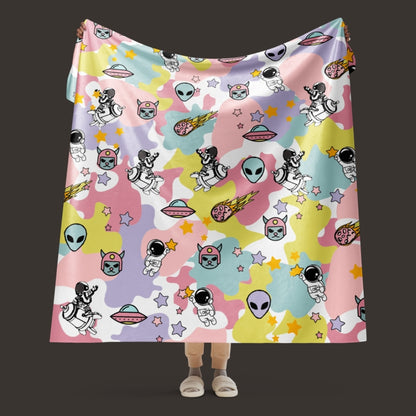 A large sherpa blanket with a dreamy ice cream like cosmos motif in y2k revival style
