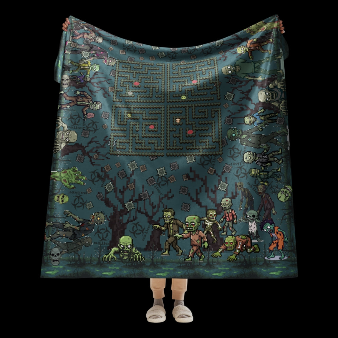 A large sherpa lined blanket featuring a zombie invasion and a maze for finding brains for the zombies