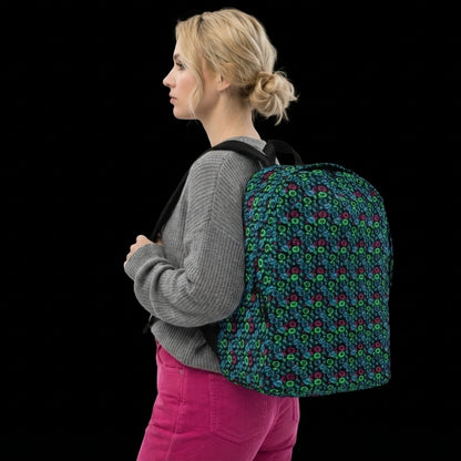 Person carrying a backpack with an alt emo skull candy pattern in teal pink and green
