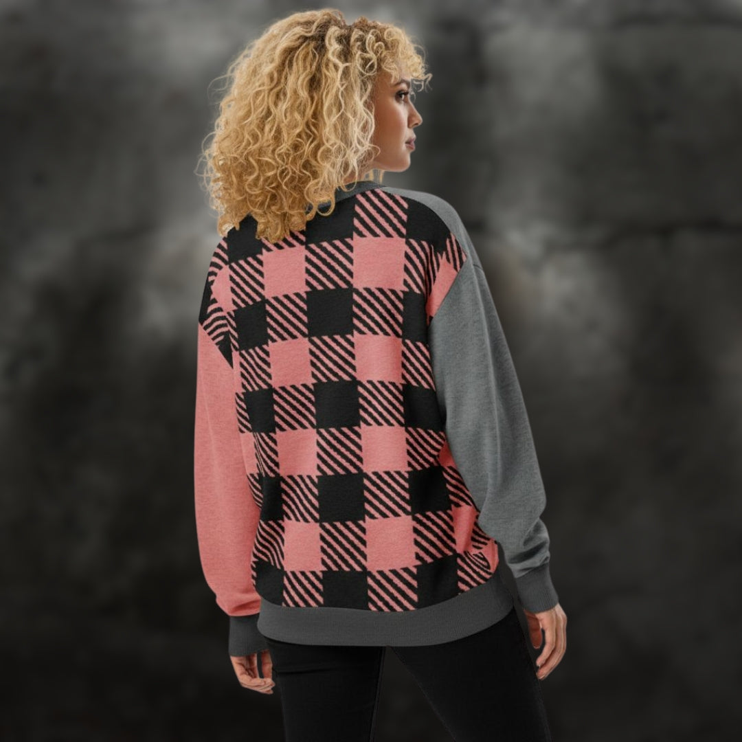 Alt style woman wearing a pink, grey and black plaid pattern knitted cardigan 