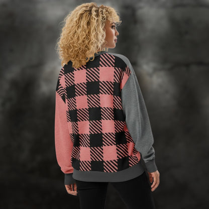 Alt style woman wearing a pink, grey and black plaid pattern knitted cardigan 