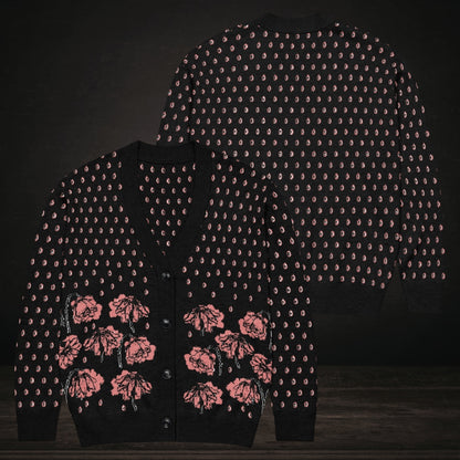 An emotional black knitted cardigan with tears and crying flowers