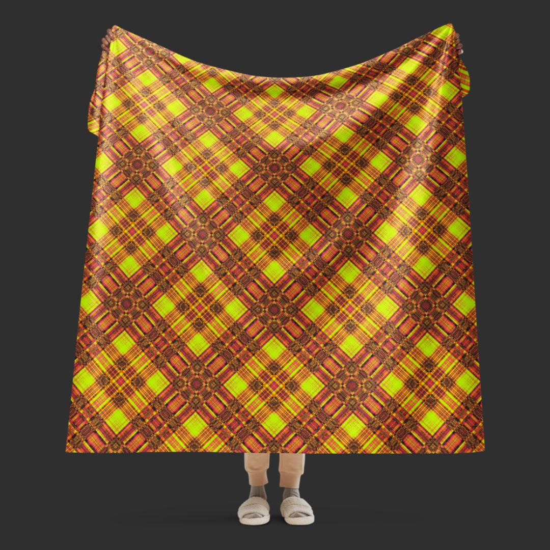 large fleece sherpa blanket with a distressed plaid pattern in yellow and rusty pink