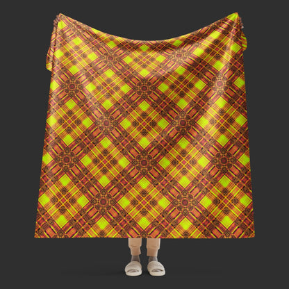 large fleece sherpa blanket with a distressed plaid pattern in yellow and rusty pink