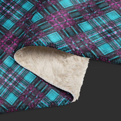 large fleece sherpa blanket with a distressed plaid pattern in electric blue and purple