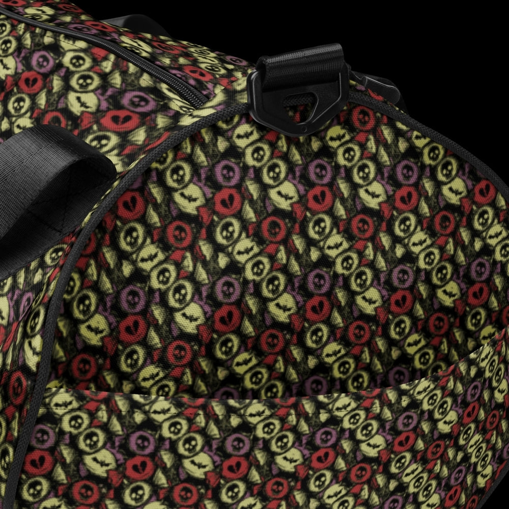 Duffel bag with a skull candy pattern in khaki purple and red shades