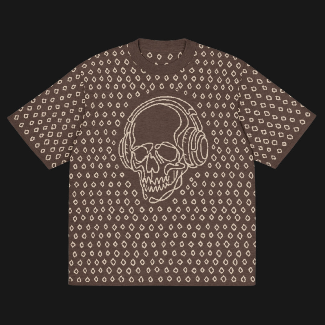 A brown short sleeve knit featuring a line art skull with headphones and hand drawn diamonds