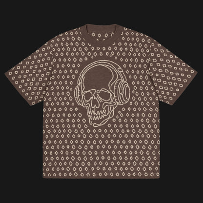 A brown short sleeve knit featuring a line art skull with headphones and hand drawn diamonds