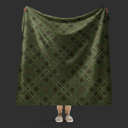 A large fleece sherpa blanket with a distressed plaid pattern in forest witchy shades