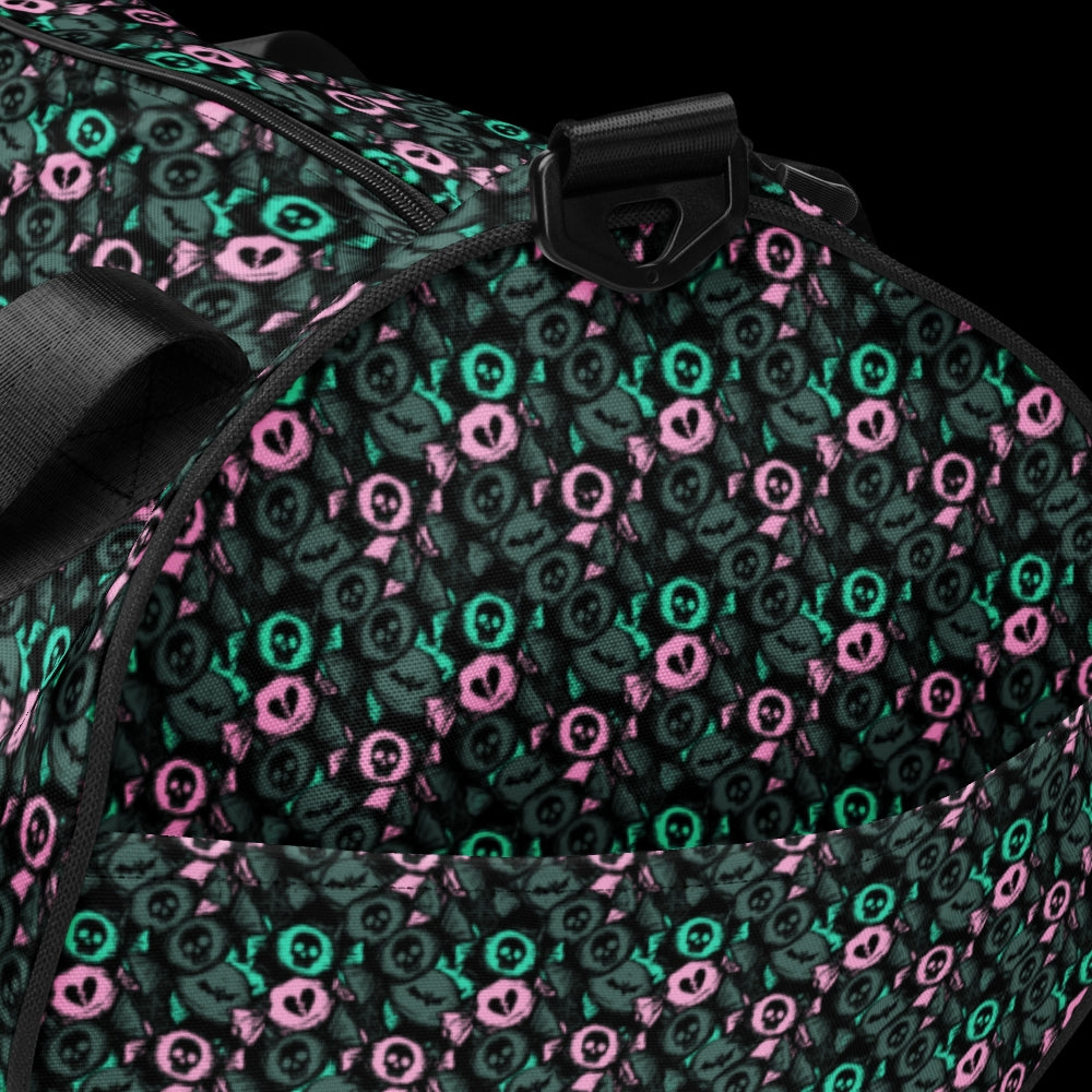 Duffel bag with a skull candy pattern in mint grey and pink shades