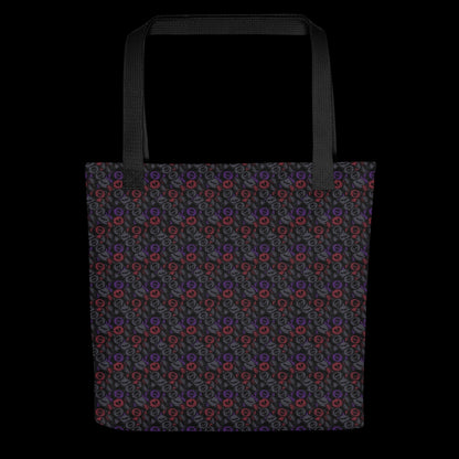 A tote bag with a skull candy pattern in dark grey, purple and red