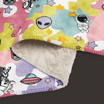 A large sherpa blanket with a dreamy ice cream like cosmos motif in y2k revival style