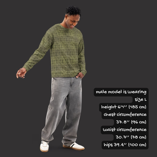 Person wearing a sweater with a dirty colored soft plaid and hand drawn pattern, plus sizing info