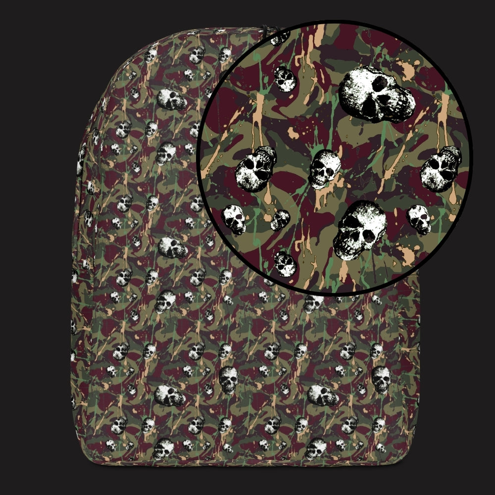 a backpack with a camo and paint and gritty skulls pattern in burgundy and green