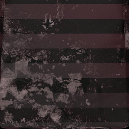 a grunge striped backpack in deep burgundy red and black, with a grungy collage that's visible close-up. 