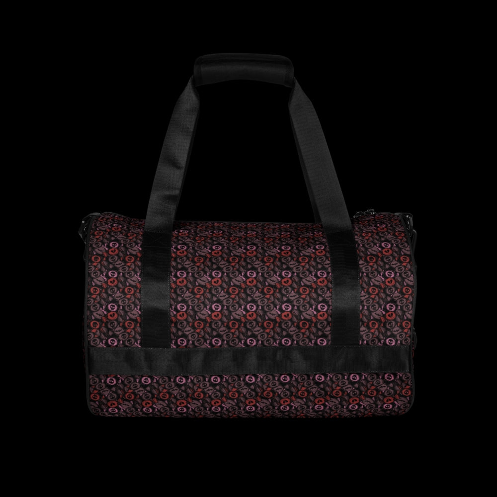Duffel bag with a skull candy pattern in red crushed velvet shades