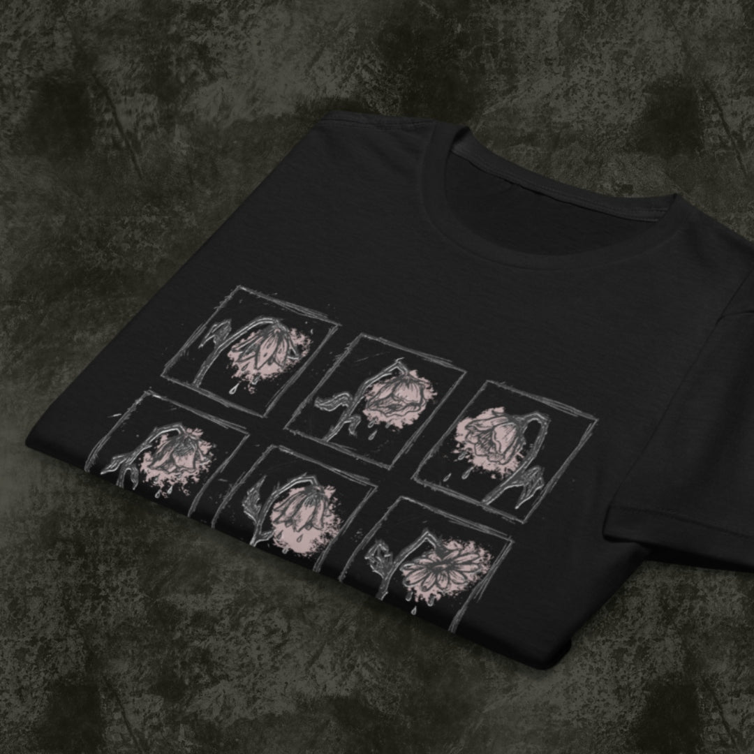 a black Gildan 64000L tee with a grid of crying wilting flowers with soft pink details