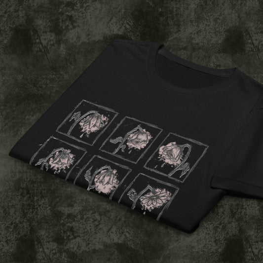 a black Gildan 64000L tee with a grid of crying wilting flowers with soft pink details