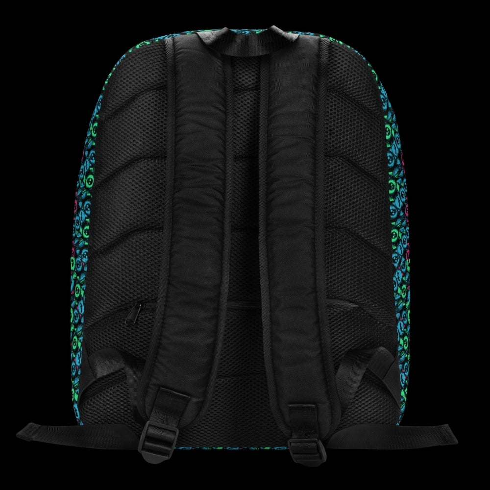 a backpack with an alt emo skull candy pattern in teal pink and green