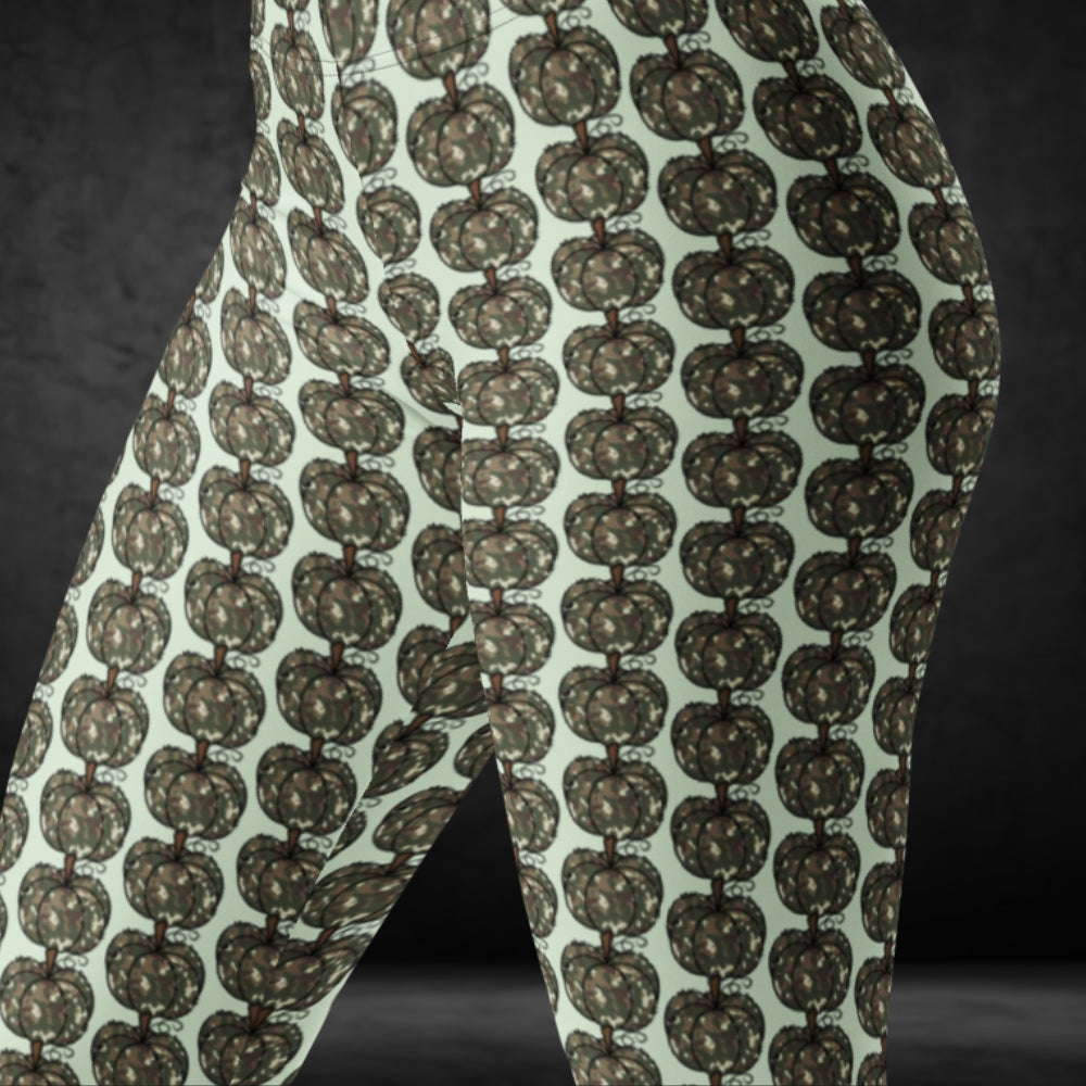 leggings with camouflage colored pumpkins on mint background