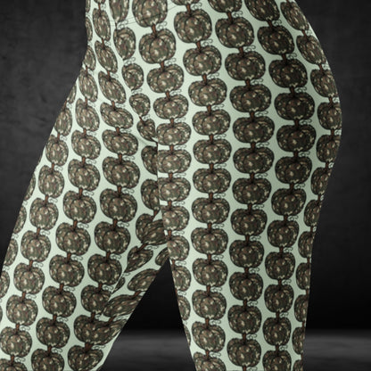 leggings with camouflage colored pumpkins on mint background