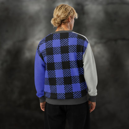 Alt style man wearing a blue, grey and black plaid pattern knitted cardigan 
