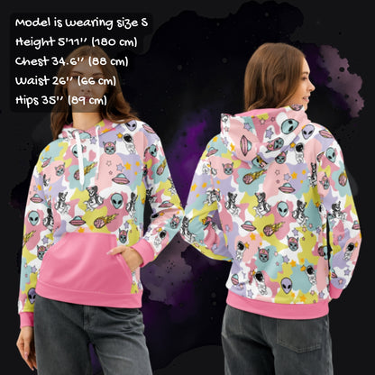 Person wearing a colorful ice cream cosmos hoodie in maximalist y2k revival spacecore style.