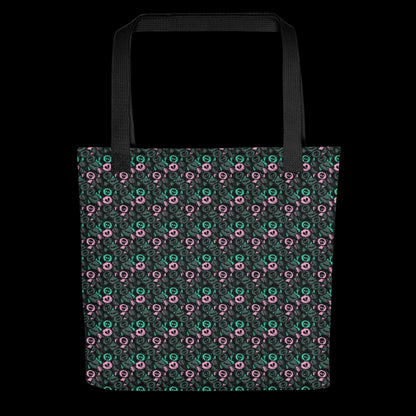 A tote bag with a skull candy pattern in grey teal and pink