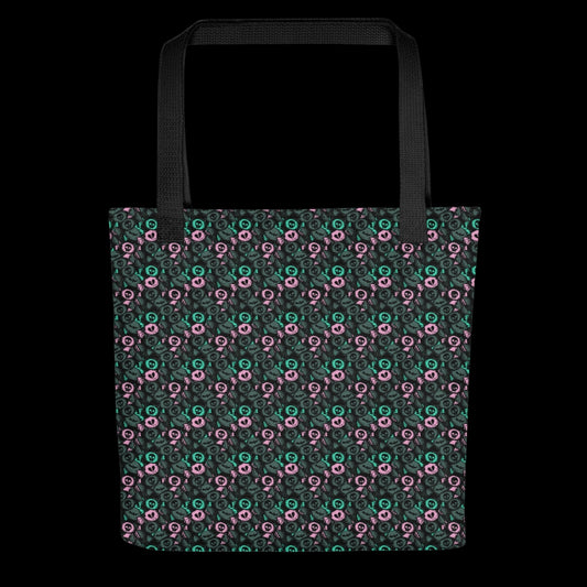 A tote bag with a skull candy pattern in grey teal and pink