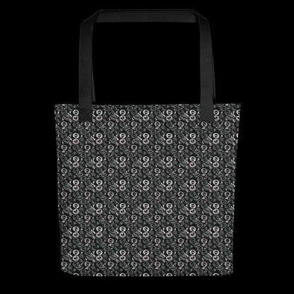 A tote bag with a skull candy pattern in grey shades