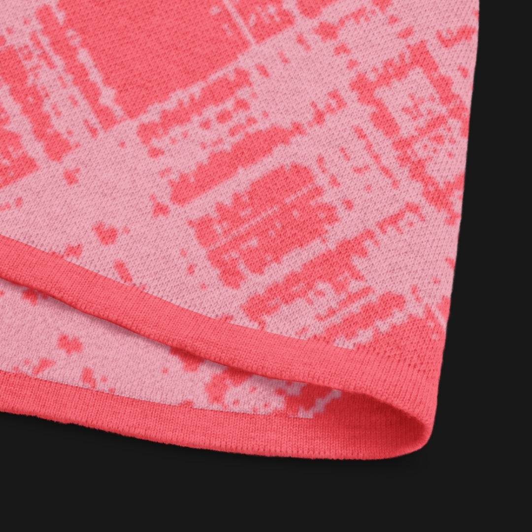 A pink glitched plaid pattern knitted tee