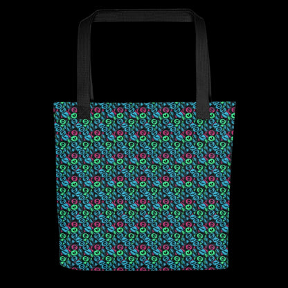 A tote bag with a skull candy pattern in bright teal, green and pink