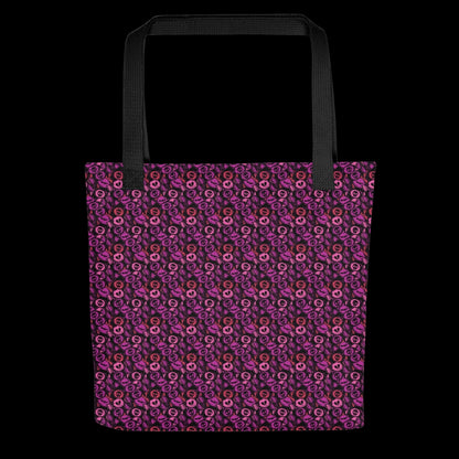 A tote bag with a skull candy pattern in pink red and purple