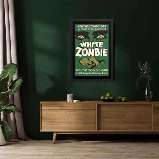 a framed poster with a vintage horror movie design, white zombie on a wall