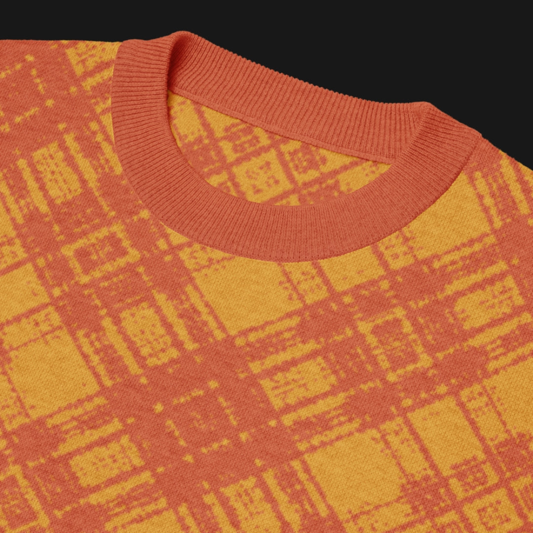 A pop punk orange glitched plaid pattern knitted tee