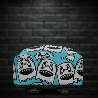 A backpack with large grey grinning goblins on skye blue background