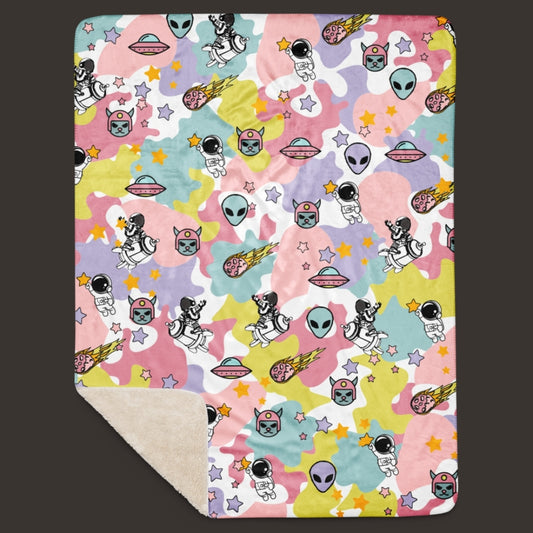 A large sherpa blanket with a dreamy ice cream like cosmos motif in y2k revival style