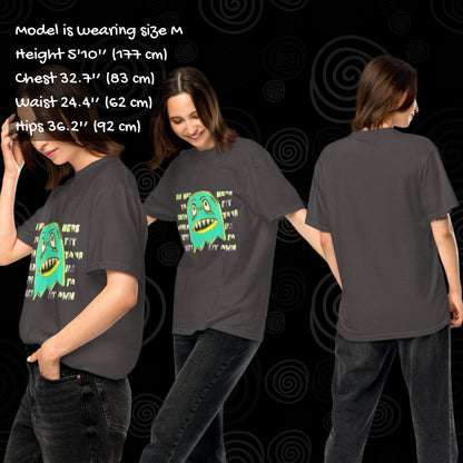 Person wearing a Comfort colors 1717 tee with a monster and text "i'm not her to fit into your world, i'm here to make my own" with sizing info