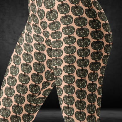 leggings with camouflage colored pumpkins on peach background