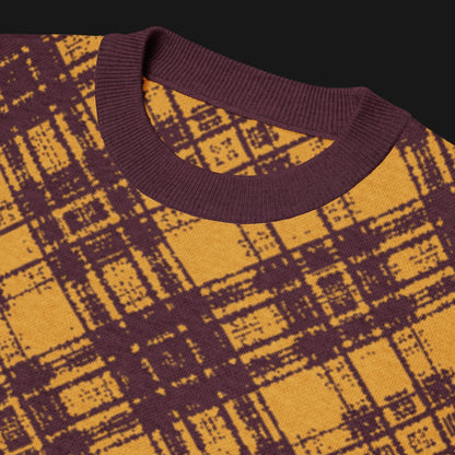 A burgundy and mustard glitched plaid pattern knitted tee