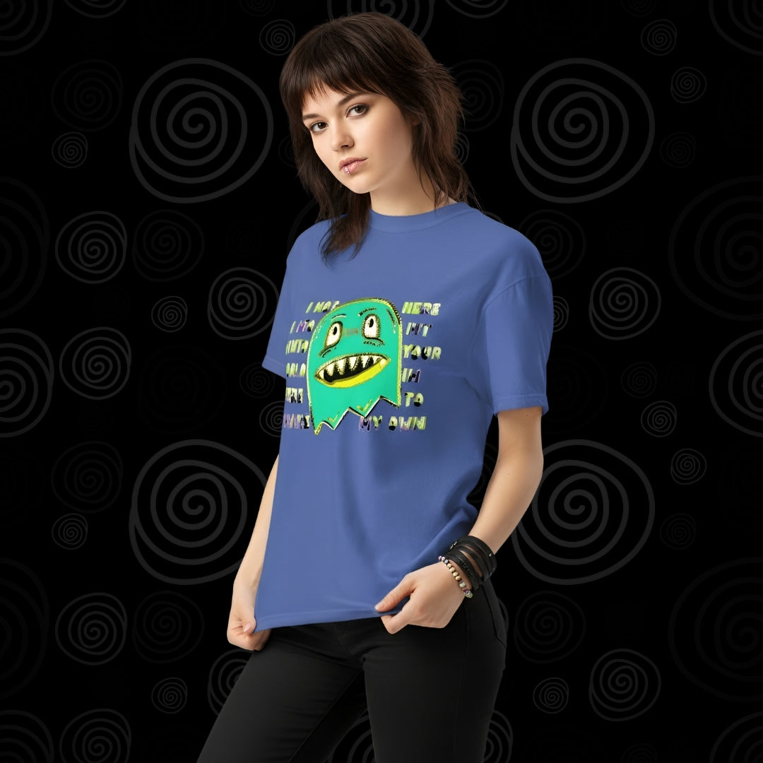 Person wearing a Comfort colors 1717 tee with a monster and text "i'm not her to fit into your world, i'm here to make my own"
