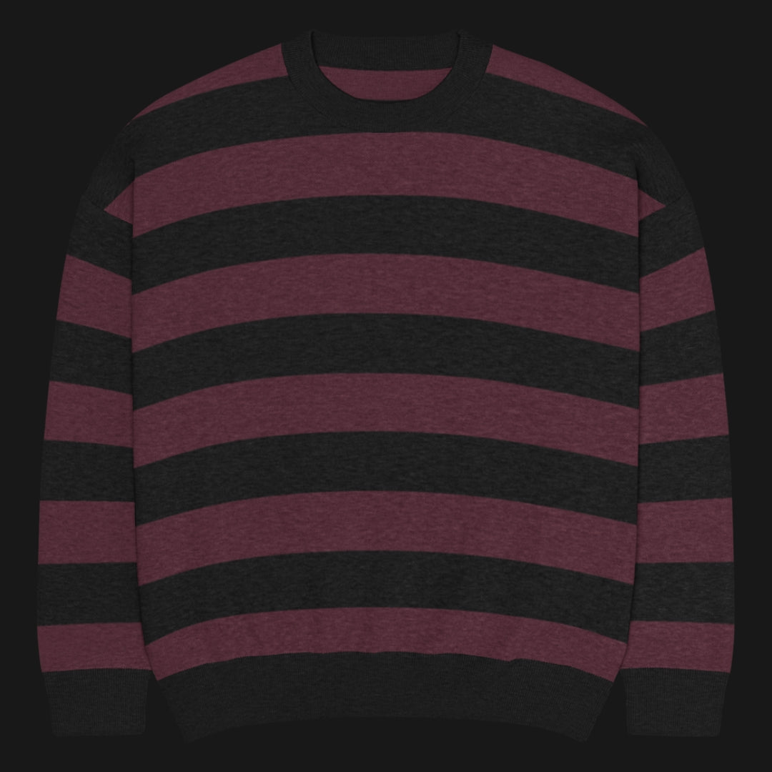 a grunge striped sweater with wide black and dark stripes