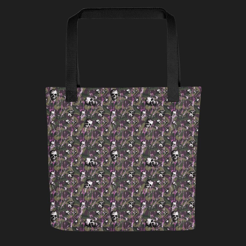 Tote bag with a rebellious camo background, gritty skulls, and purple paint splatter