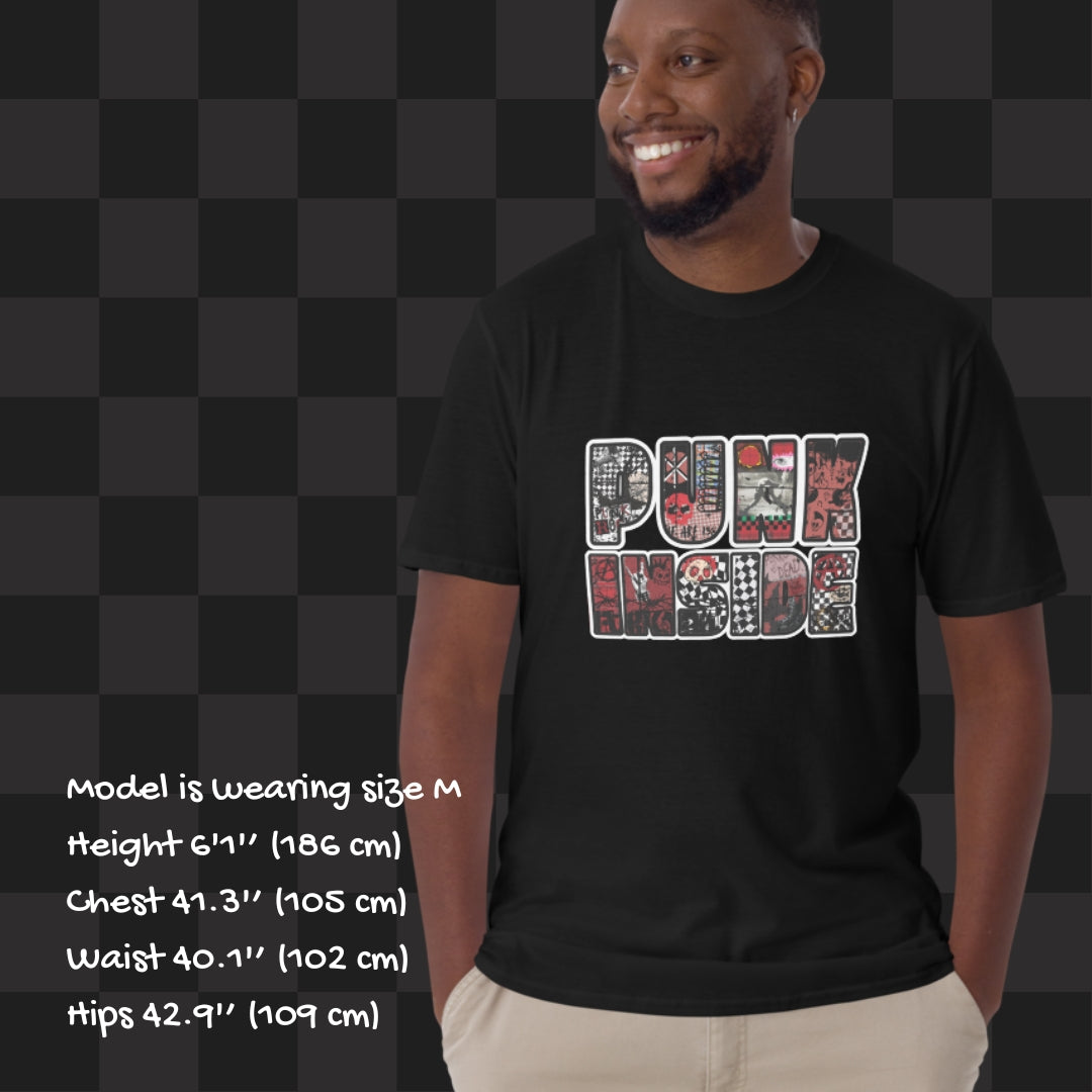 Person wearing a black tee with large "PUNK INSIDE" text and the letters filled with punk symbols collage 