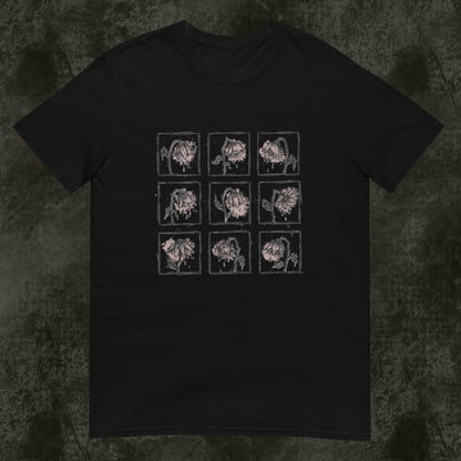 A black gildan 64000 tee with a grid of sad crying flowers in soft pink