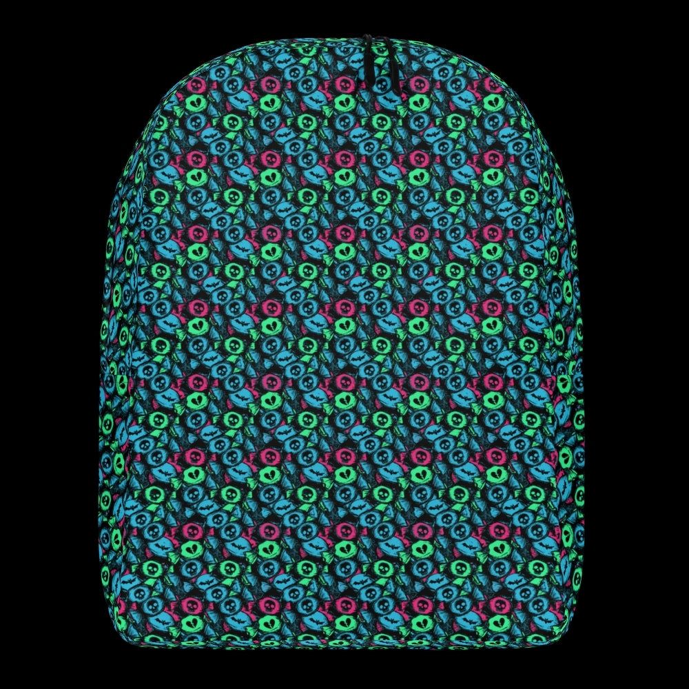 a backpack with an alt emo skull candy pattern in teal pink and green