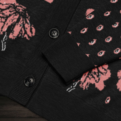 An emotional black knitted cardigan with tears and crying flowers