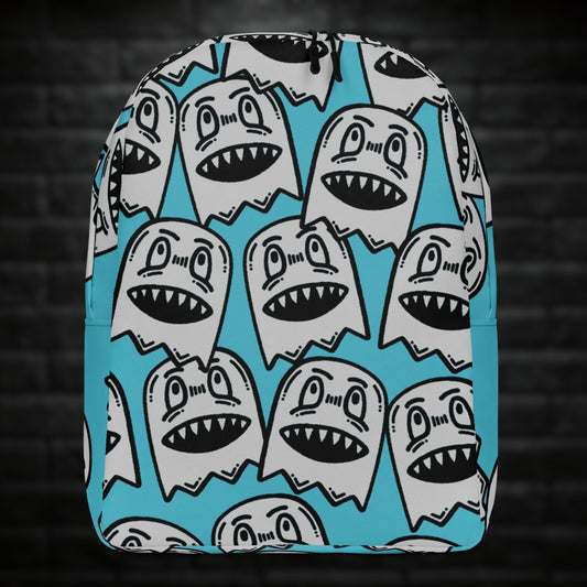 A backpack with large grey grinning goblins on skye blue background